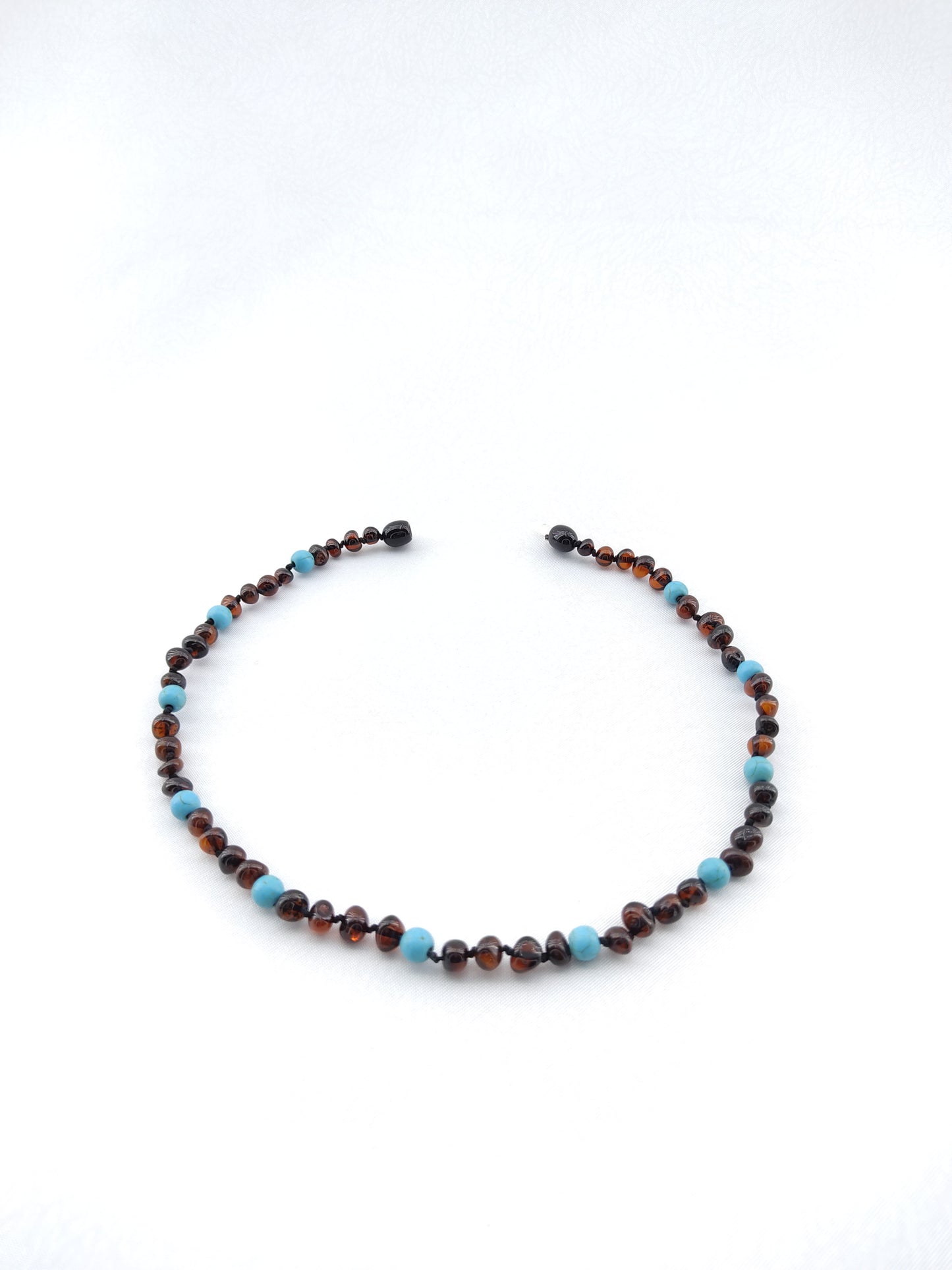 Dark cherry baltic amber mixed with 'Firuze " natural stone necklace .